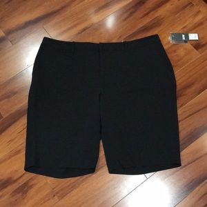 Black Bermuda work shorts.